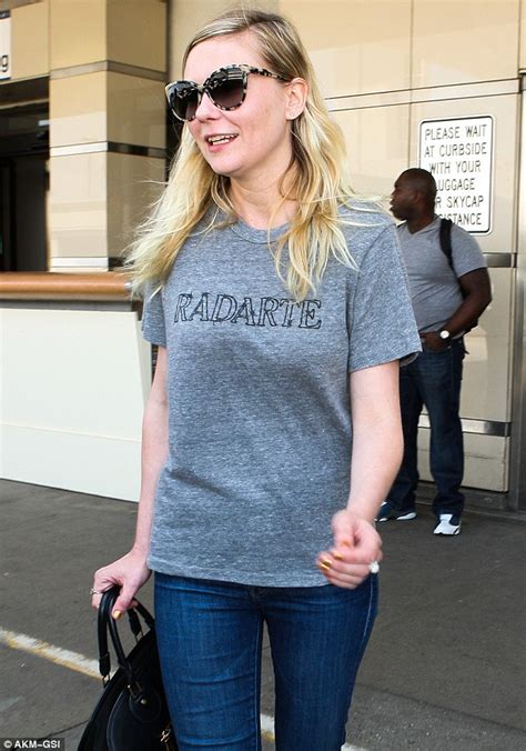 Kirsten Dunst Ditches The Glam For Dressed Down Cool As She Jets Away