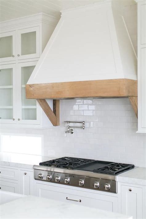 We did not find results for: Gorgeous kitchen features a white French hood with a ...