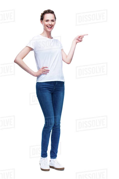 Beautiful Woman In White T Shirt Pointing Somewhere Isolated On White