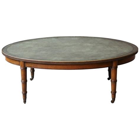 While it certainly has his signature asian inspired form, it was designed by theodore muller and isabel barringer for kittinger. Rare Kittinger Coffee Table with Green Embossed Leather ...