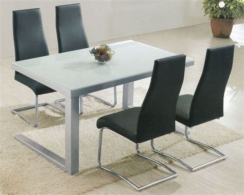Table is made of glass and chrome silver base. Modern Glass Top Dining Set OL-5