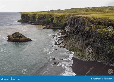 Atlantic Ocean And Black Rock Cliff Of Western Iceland Coast Sn Stock