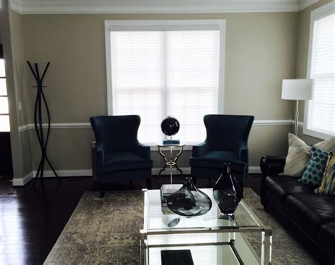 White Drapery Over Silhouettes In Modern Glam Living Room Modern