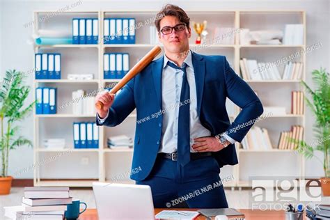 Angry Aggressive Businessman In The Office Stock Photo Picture And