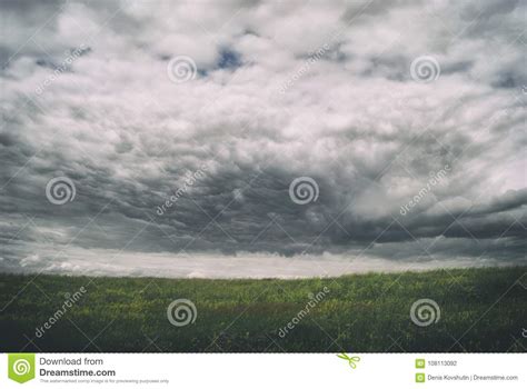Stormy Cirrus Cumulus Clouds Over The Vast Green Meadows Thunderstorm