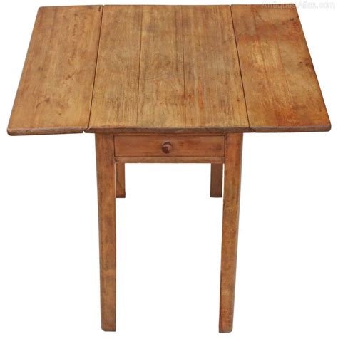 The table is fitted with an all round dovetailed drawer, set. Drop Leaf Scrub Top Pine Kitchen Dining Table - Antiques Atlas