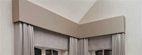 Contemporary Upholstered Pelmets At Corner Windows In A Soft Neutral