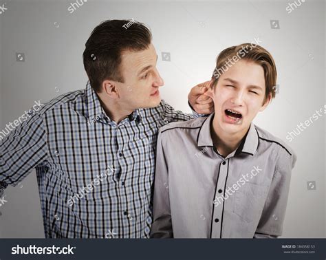 strict father punishes his son stock fotografie 184358153 shutterstock