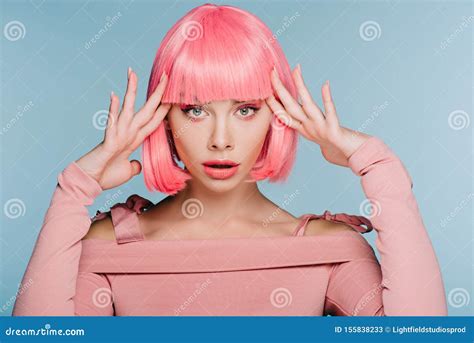 Attractive Shocked Girl Gesturing And Posing In Pink Wig Isolated Stock Image Image Of Woman
