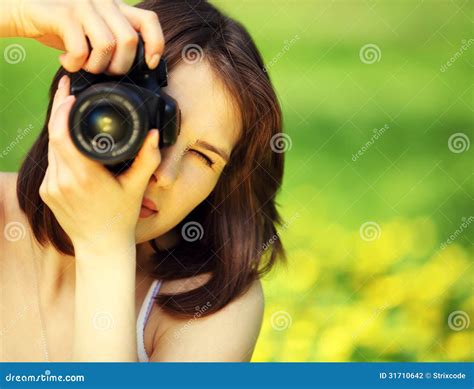 Young Beautiful Woman Photographing In Summer Park Stock Photo Image