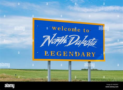 North Dakota Welcome Sign Along The Highway At The State Border Stock