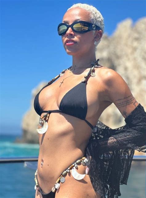Doja Cat Sizzles While Showing Off All Her Curves In A Thong Bikini Celebk