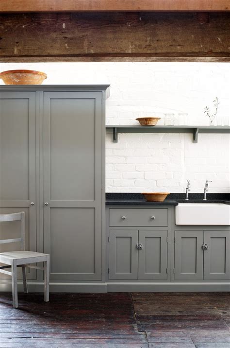 Wasted space behind your walls. love the colors and the tall pantry cabinet | Loft kitchen ...