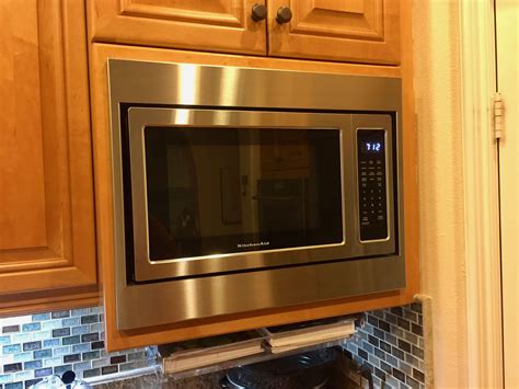 This toshiba 1.2 cubic feet black stainless steel microwave is the ideal size for apartment kitchens or office break rooms. Custom trim kit for a KitchenAid microwave, model ...