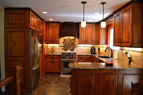 A peninsula kitchen layout resembles a parallel kitchen without one divider; Pin by Aspen Kitchens Inc on Company Projects | Small ...