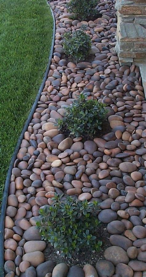 Stone slabs on raised beds are simply perfect in this small front yard landscaping idea. 50+ Awesome Low Maintenance Front Yard Landscaping Ideas ...