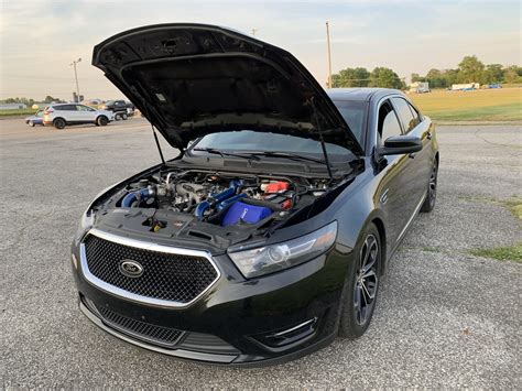 Sel models get painted aluminum wheels and chrome exhaust tips; 2014 Tuxedo Black Ford Taurus SHO Pictures, Mods, Upgrades ...