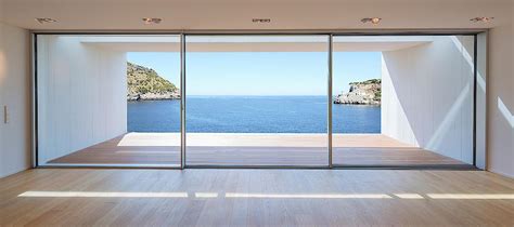 Another alternative is the moving glass door. KELLER minimal windows, large-scale frameless sliding ...