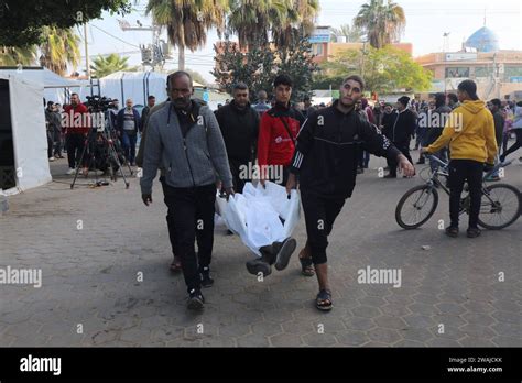 Palestinians who lost their loved ones mourn as bodies of the deceased