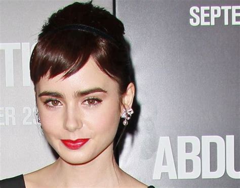 Lily Collins Channels Audrey Hepburn With Short Bangs A Bun And
