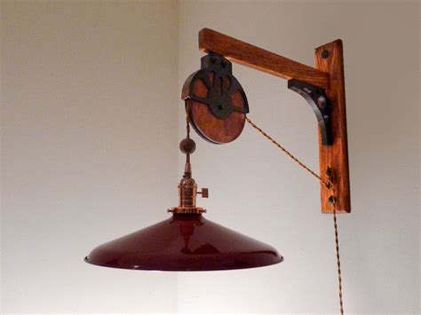 This type of fixture works extremely well for providing. Barn pulley lamp Made of red oak with faux barn pulley ...