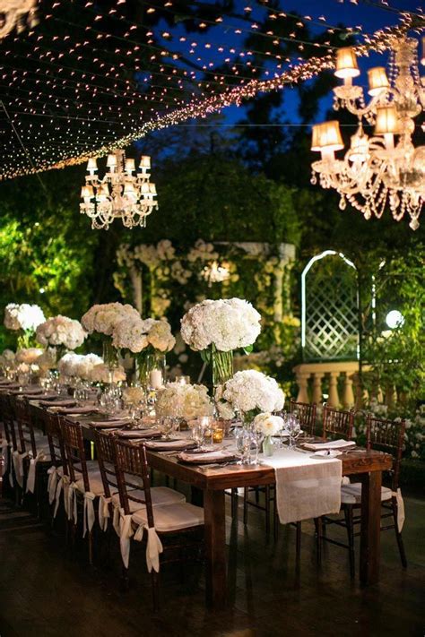 Fairy lights and flowers make for the most beautiful reception. Love