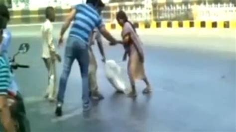 Pedestrians Stick To Road Surface After Scorching Heatwave Melts Tar In India