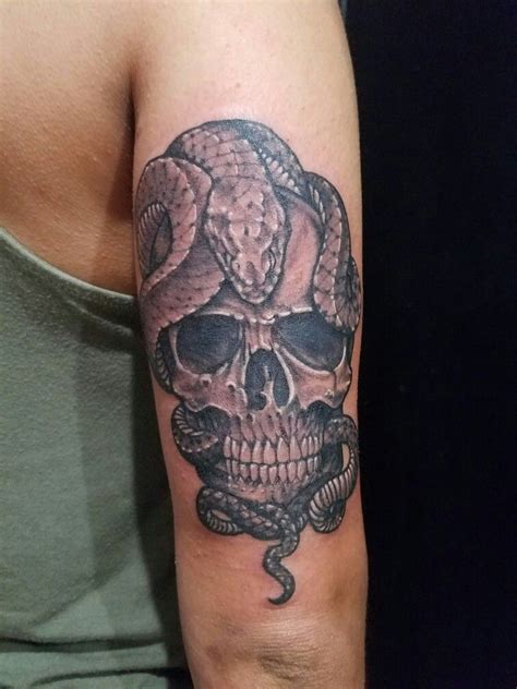 Skull And Snake Tattoo Snake Tattoo Tattoos Snake