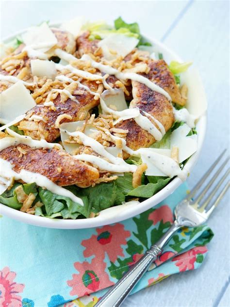 If desired, drizzle with additional dressing. Blackened Chicken Caesar Salads with Crispy Onions ...