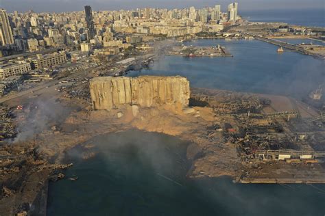 People run in the aftermath of a massive explosion in beirut, aug. Lebanon Assesses Aftermath of Huge Beirut Explosion