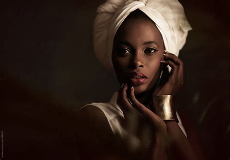 African Woman With A White Turban By Stocksy Contributor Lumina