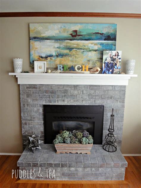 Saturate the bricks with plain water. Puddles & Tea: White Wash Brick Fireplace Makeover