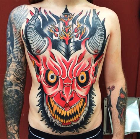 Lines, geometric patterns and elements were all combined to come up with this awesome tribal tattoo on upper extremities. Torso Tattoos Designs, Ideas and Meaning | Tattoos For You