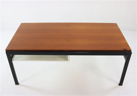 A marble coffee table will be a grand focal point. Dutch design sixties coffee table for Ums Pastoe