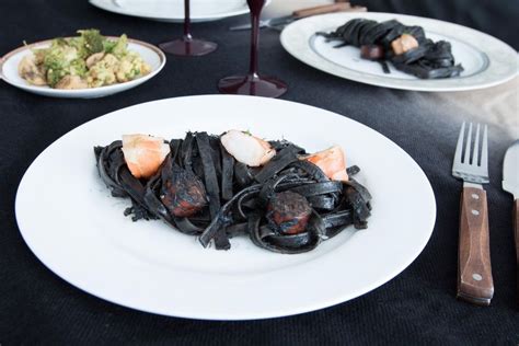 Squid Ink Pasta 20 With Prawns Crab Meat And Spicy Sausages