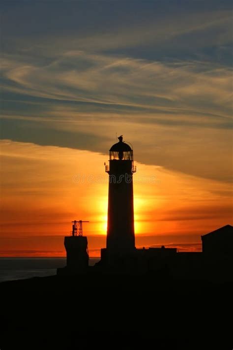 Lighthouse And Sunset Near Summer Solstice Stock Photo Image Of