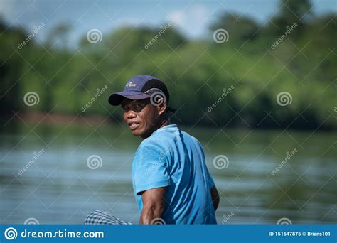 +60 89 88 53 33. Fisherman In Small Boat And Blue Shirt Editorial Image ...