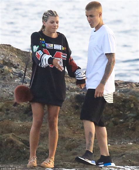 It is another photo of the tandem, once again having silly fun in the backseat of a car. Justin Bieber holds hands with Sofia Richie during ...