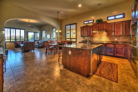 This was at a conference of the women's institute for freedom of the press led by katherine lawrence of. Country Great Room with Kitchen island by Stephen Shefrin ...