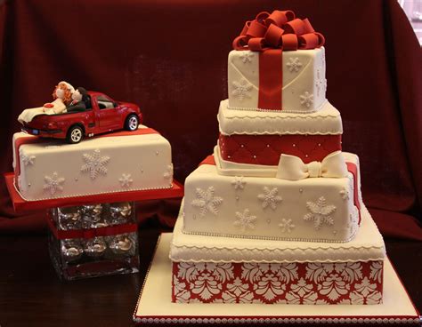 Three Tiered Wedding Cake Decorated With Red And White Ribbon