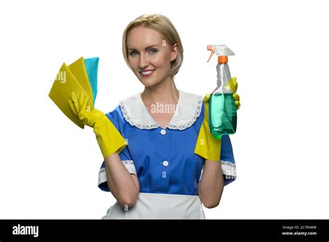 Smiling Blonde Maid Holding Rag And Spray Cleaner Gun White Background