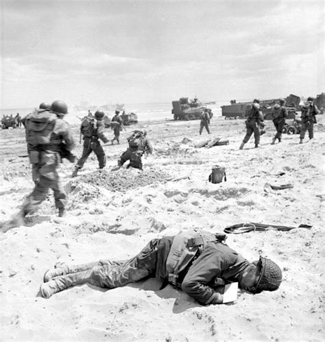 Find & download the most popular day of the dead photos on freepik free for commercial use high quality images over 8 million stock photos. U.S. Army troops forge ahead on Omaha Beach past a fallen ...