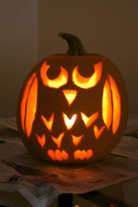 Display your carved pumpkin alone or with another owl pumpkin idea like this one made with sunflower seeds. Owl Pumpkin! | holly.schaeffer | Flickr