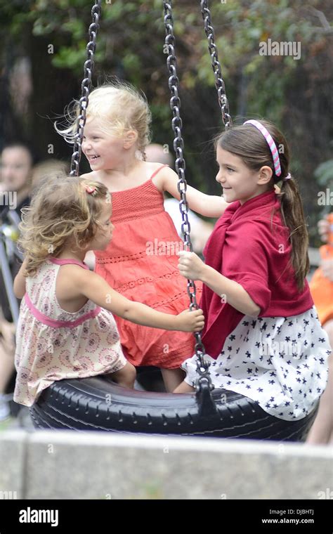 Katie Holmes And Daughter Suri Cruise Enjoy A Day At Brooklyn Bridge Park Featuring Katie