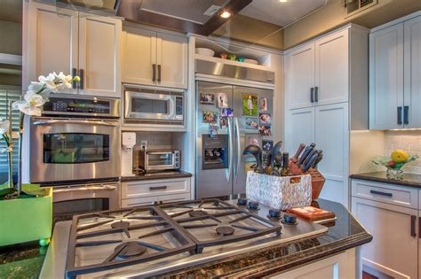 3 large bedrooms, a 4 piece bath, & a 2 piece ensuite complete the main level. Carmel Valley Cabinet Refacing Project - Boyars Kitchen ...