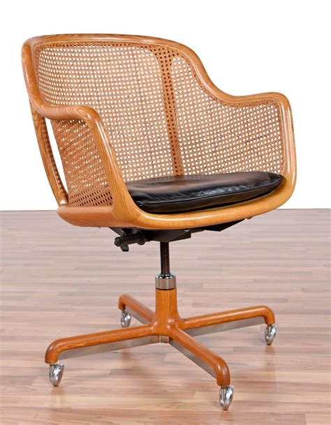 The tan leather has buttons in it which helps to. Mid-Century Modern Cane Swivel Desk Chair by Ward Bennett ...