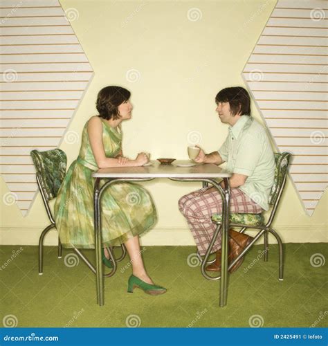 Couple Sitting At Table Stock Image Image Of Indoors 2425491