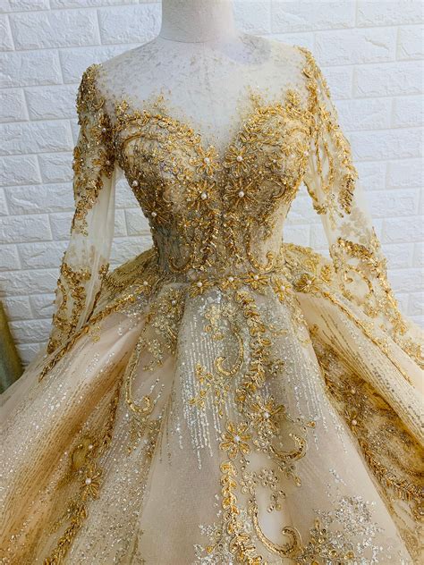 Long Sleeves Gold Beaded Sparkle Ball Gown Wedding Dress With Glitter