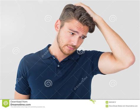 Portrait Of Concerned Man With Grey Background Stock Photo Image Of