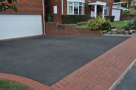 This red and charcoal accent brick driveway looks stylish as it winds its method to the house. We have enough of these red pavers to do an entire ...